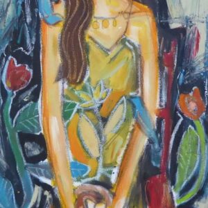 Fille assise dans un jardin avec un nid